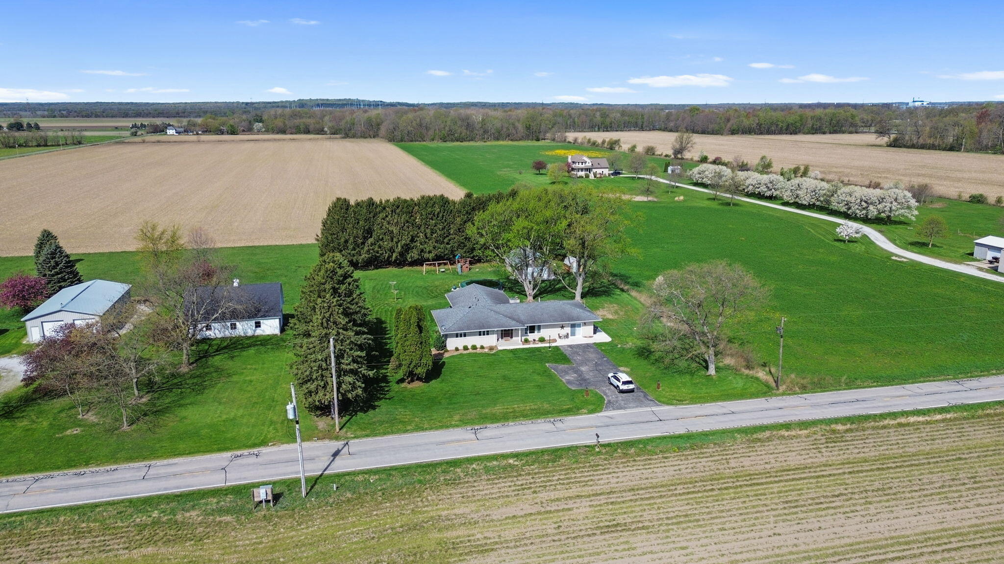 56915 Tulip Road New Carlisle, IN 46552 - Photo 15 of 19 an aerial view of a houses with outdoor space and ocean view