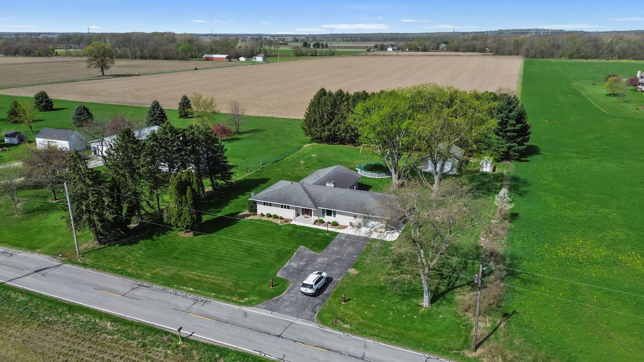 56915 Tulip Road New Carlisle, IN 46552 - Photo 4 of 19 a lake view with a garden and houses