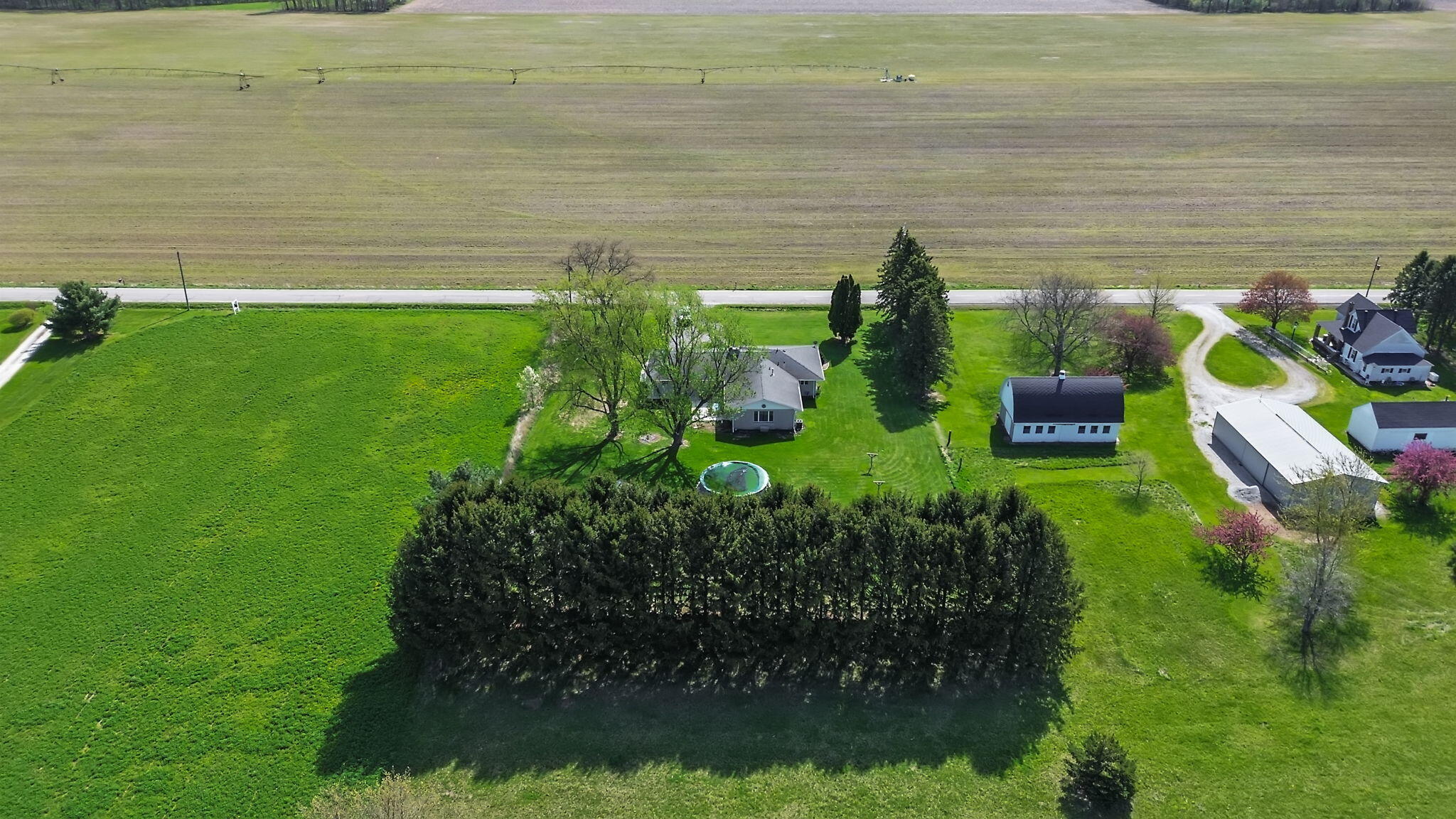 56915 Tulip Road New Carlisle, IN 46552 - Photo 8 of 19 a view of a garden with lawn chairs