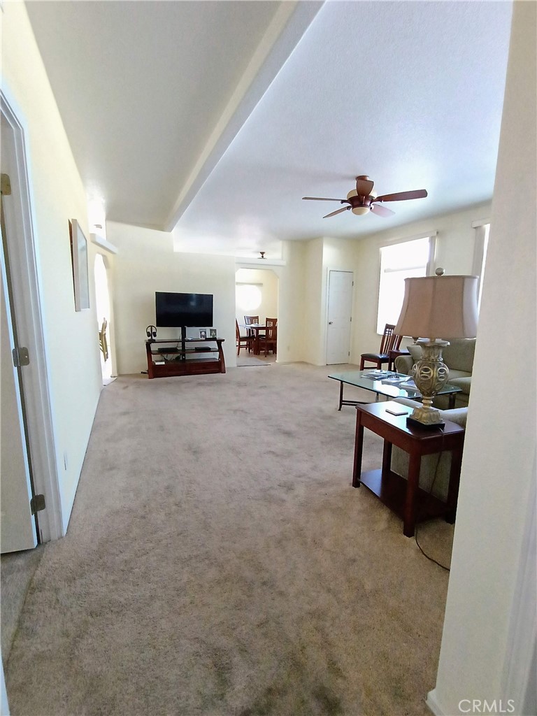 17640 Corkill Road, Unit 40 Desert Hot Springs, CA 92241 - Photo 13 of 55 View into living room