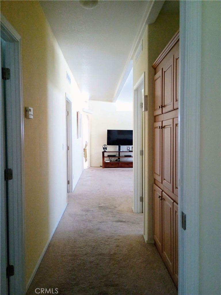 17640 Corkill Road, Unit 40 Desert Hot Springs, CA 92241 - Photo 22 of 55 Hallway w/ plenty of cabinet space