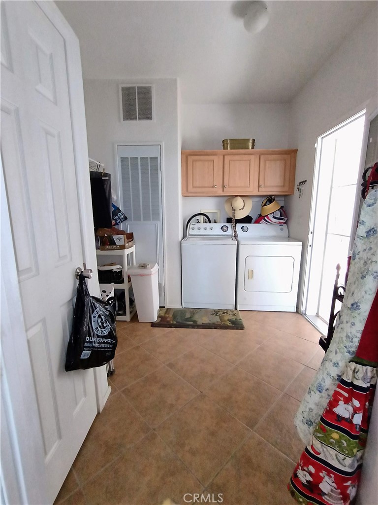 17640 Corkill Road, Unit 40 Desert Hot Springs, CA 92241 - Photo 28 of 55 Large laundry room