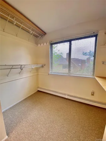 a bathroom with a sink a toilet and a shower