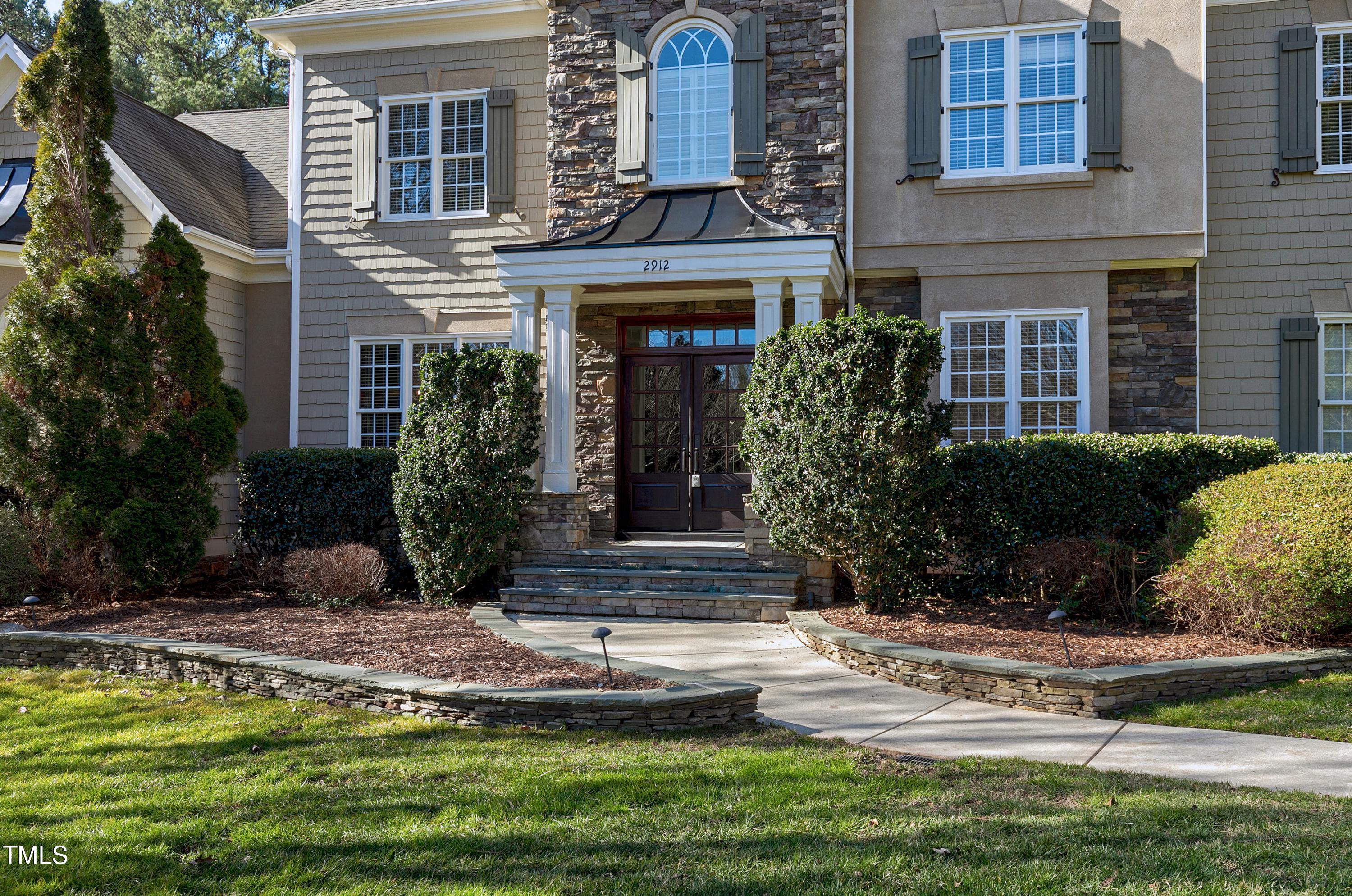 2912 Ryton Court Raleigh, NC 27613 - Photo 4 of 86 a front view of a house