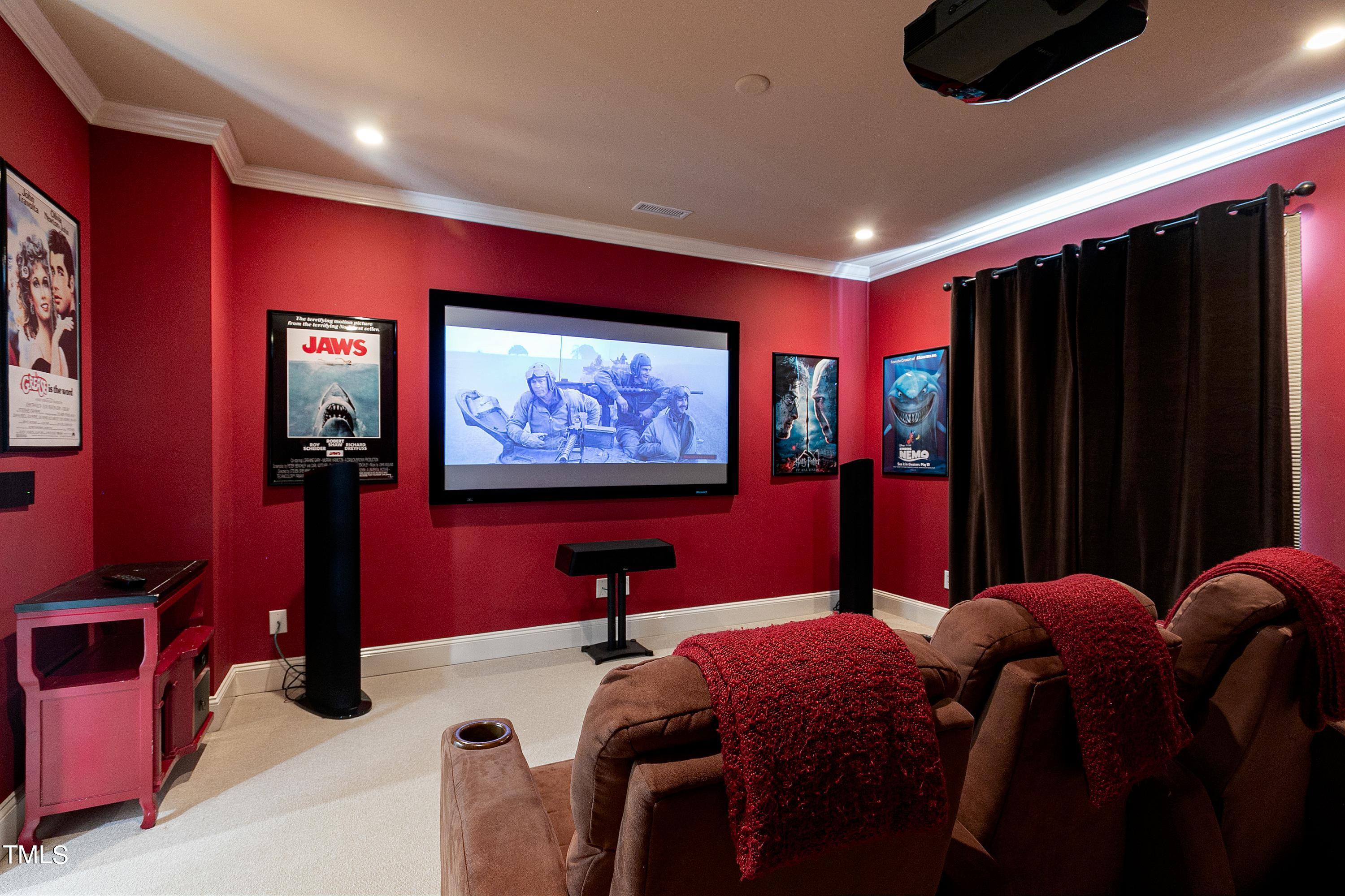2912 Ryton Court Raleigh, NC 27613 - Photo 42 of 86 a projector room with pool table projector and screen