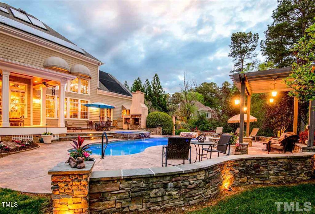 2912 Ryton Court Raleigh, NC 27613 - Photo 62 of 86 a view of a swimming pool with a patio