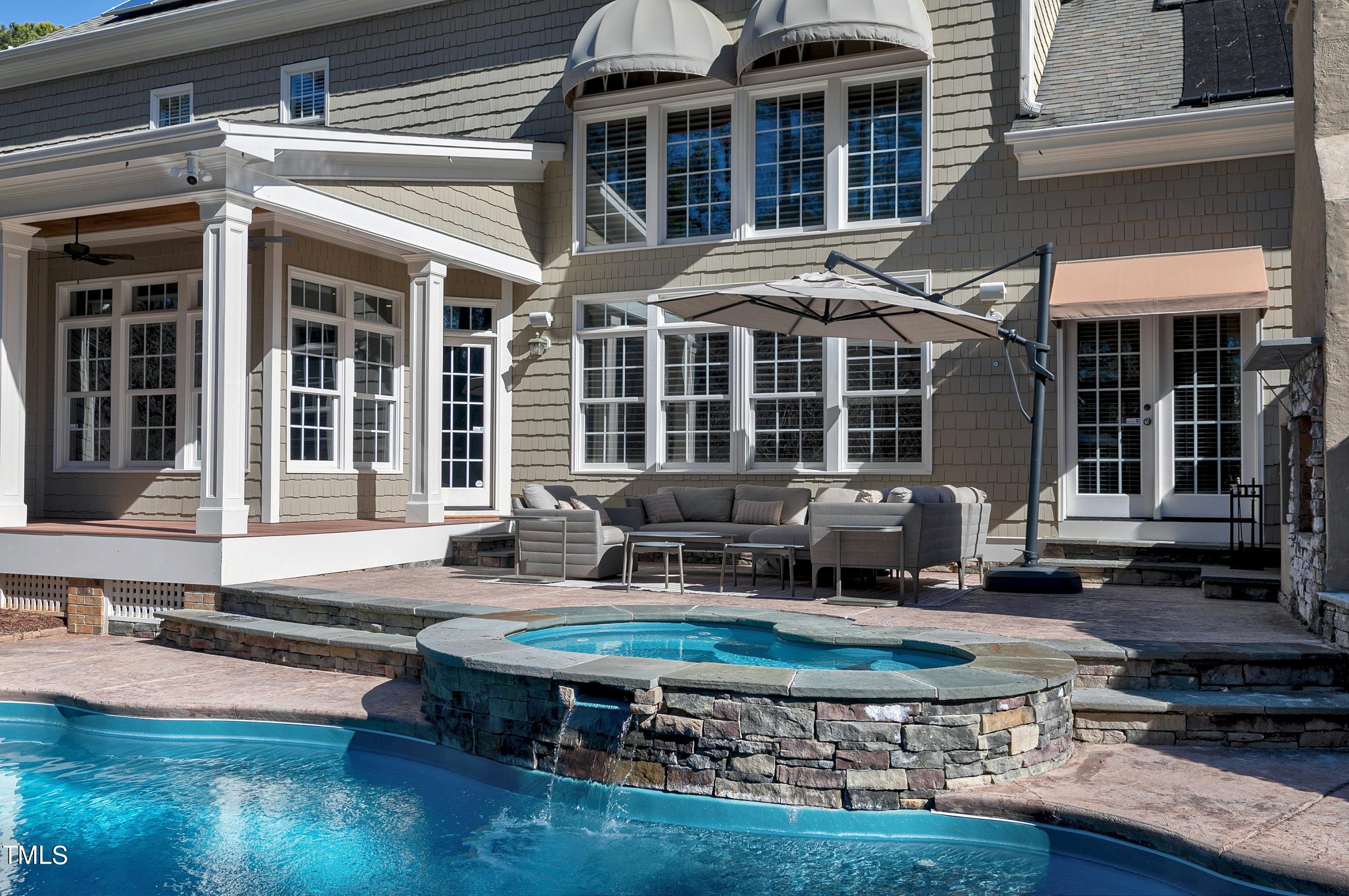 2912 Ryton Court Raleigh, NC 27613 - Photo 67 of 86 a view of a house with swimming pool and sitting area
