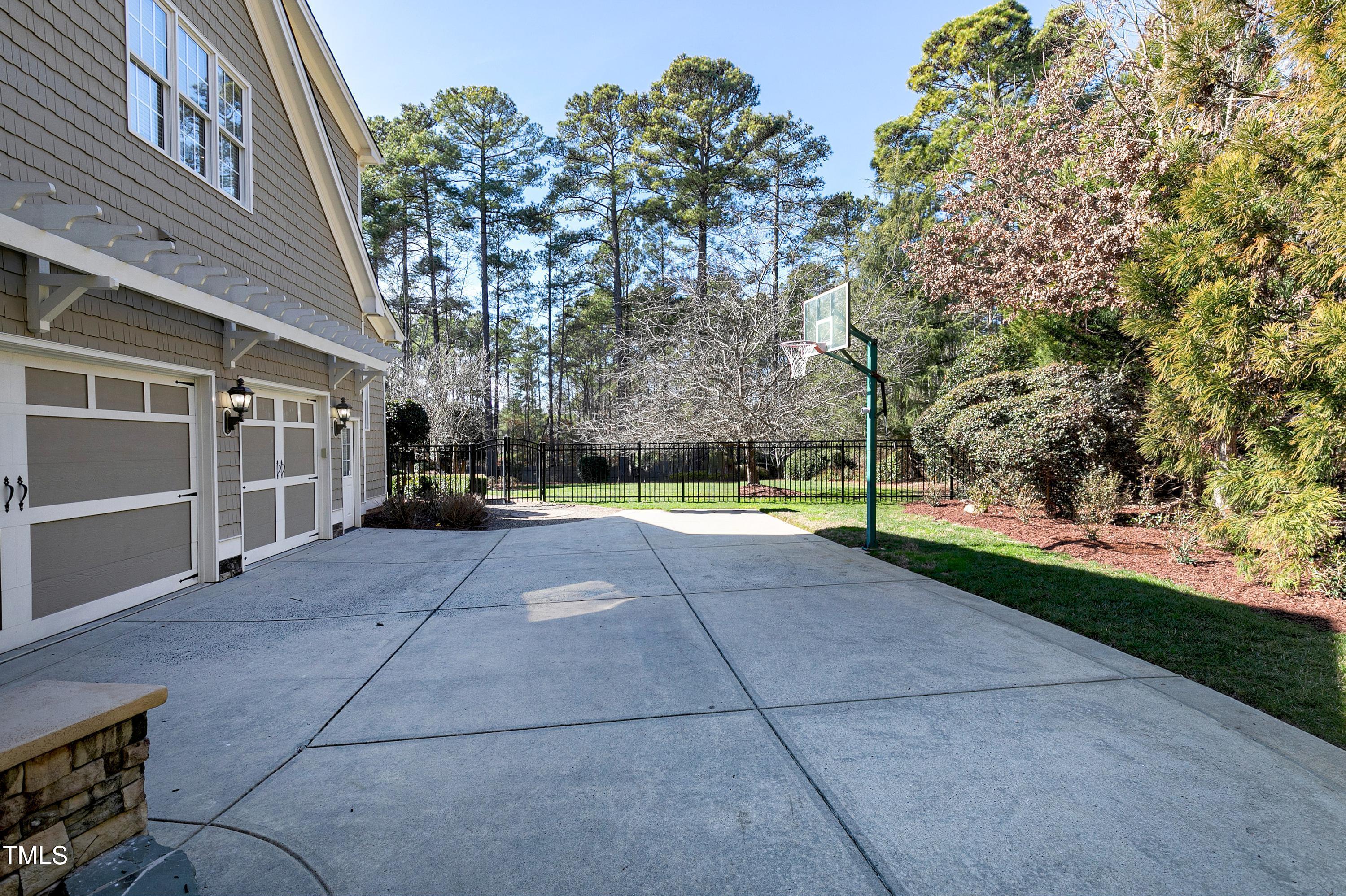 2912 Ryton Court Raleigh, NC 27613 - Photo 79 of 86 a view of a house with a yard and tree s