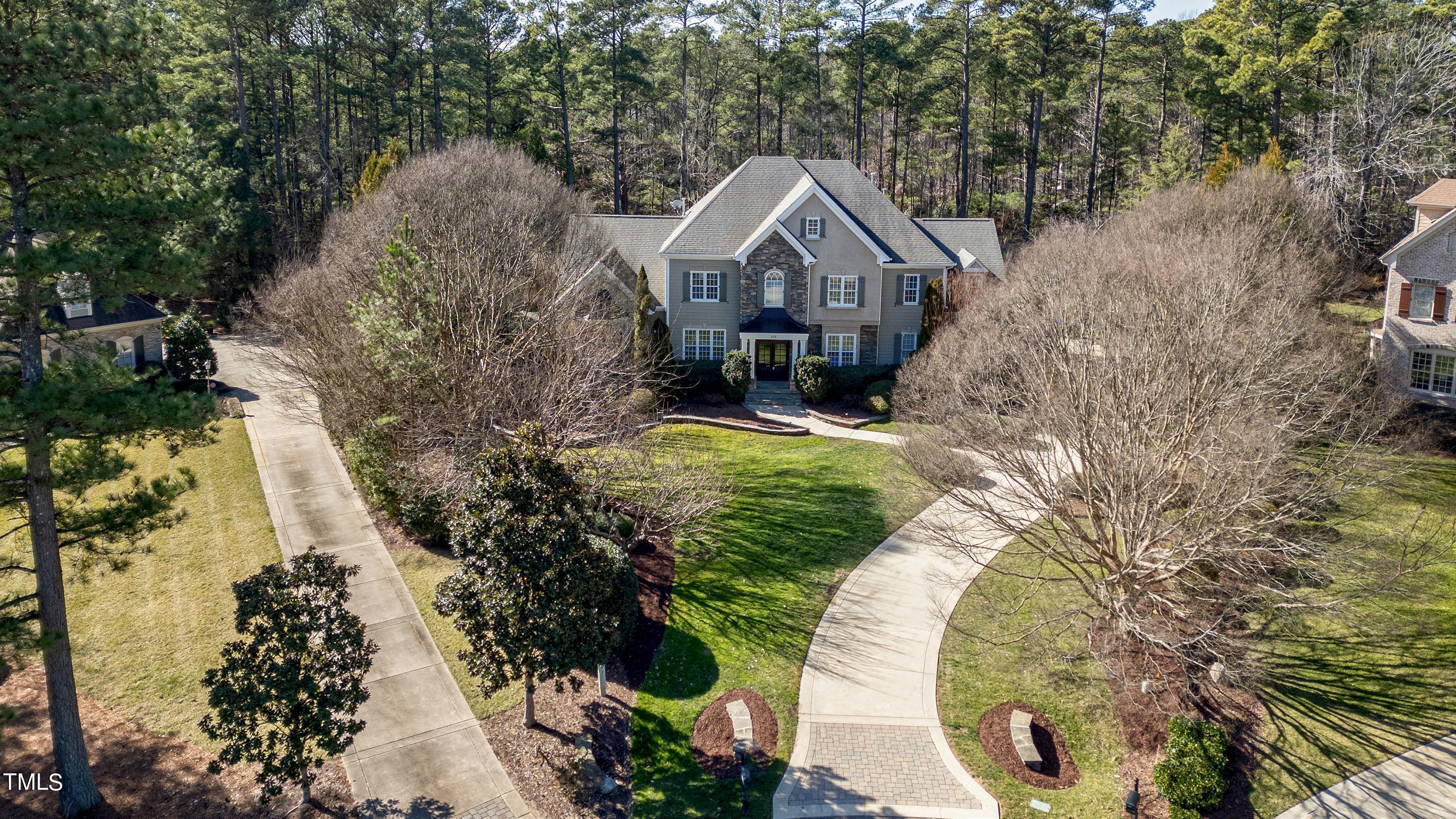 2912 Ryton Court Raleigh, NC 27613 - Photo 80 of 86 a front view of a house with a yard and garage