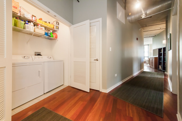 520 South State Street, Unit 501 Chicago, IL 60605 - Photo 2 of 25 a view of a bedroom with wooden floor