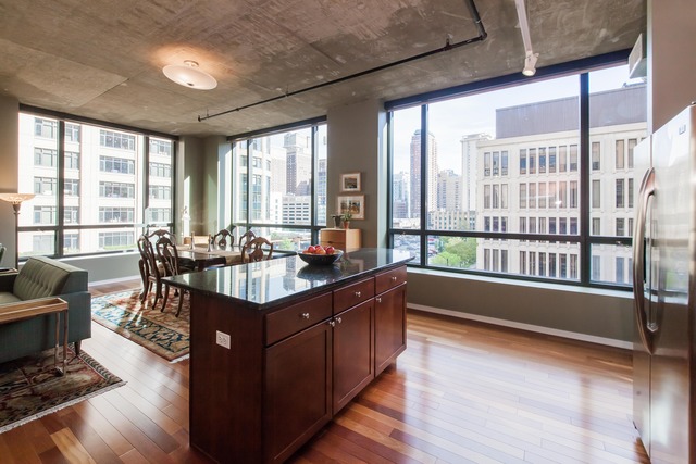 520 South State Street, Unit 501 Chicago, IL 60605 - Photo 13 of 25 a kitchen with counter top space and windows