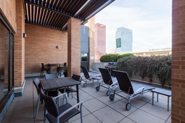 520 South State Street, Unit 501 Chicago, IL 60605 - Photo 24 of 25 a view of a terrace with furniture and a potted plant