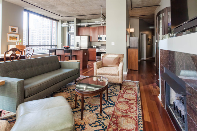 520 South State Street, Unit 501 Chicago, IL 60605 - Photo 4 of 25 a living room with furniture and a large window