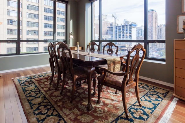 520 South State Street, Unit 501 Chicago, IL 60605 - Photo 9 of 25 a view of a dining room with furniture and window
