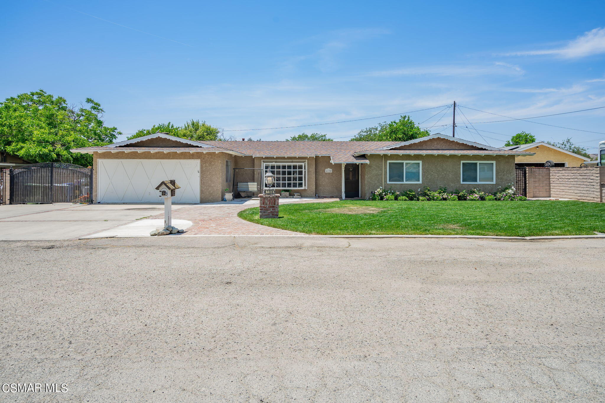 4198 Adam Road Simi Valley, CA 93063 - Photo 1 of 19 front view of a house with a yard