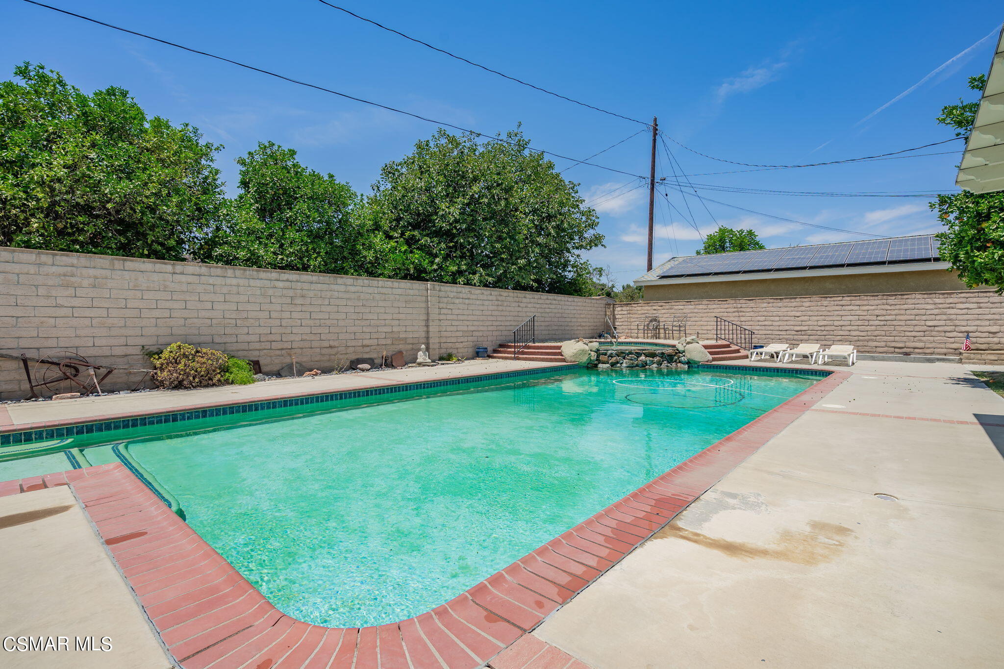 4198 Adam Road Simi Valley, CA 93063 - Photo 12 of 19 a view of a backyard with potted plants