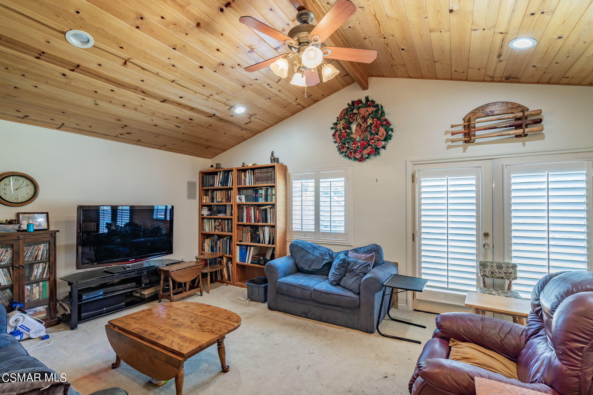 4198 Adam Road Simi Valley, CA 93063 - Photo 8 of 19 a living room with furniture and a flat screen tv