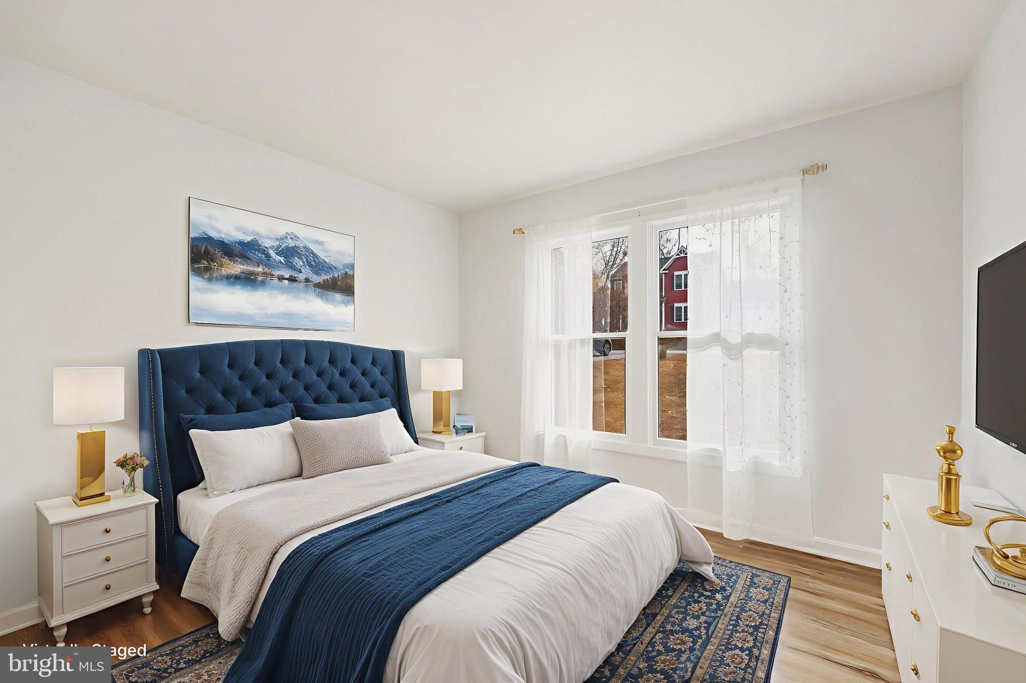 207 Spotswood Road Locust Grove, VA 22508 - Photo 18 of 58 a bedroom with a large bed and a window