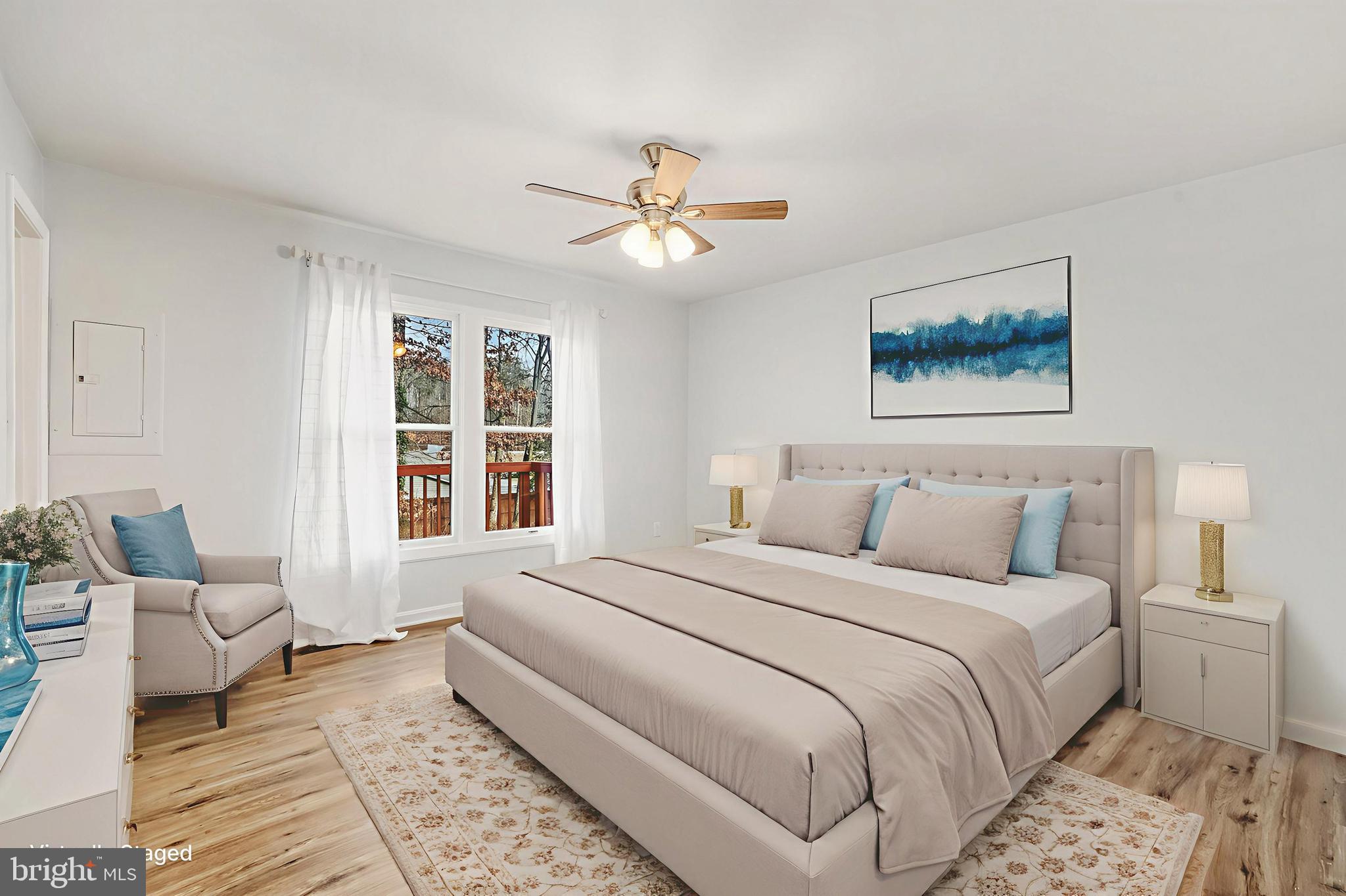 207 Spotswood Road Locust Grove, VA 22508 - Photo 21 of 58 a bedroom with a large bed couch and a window