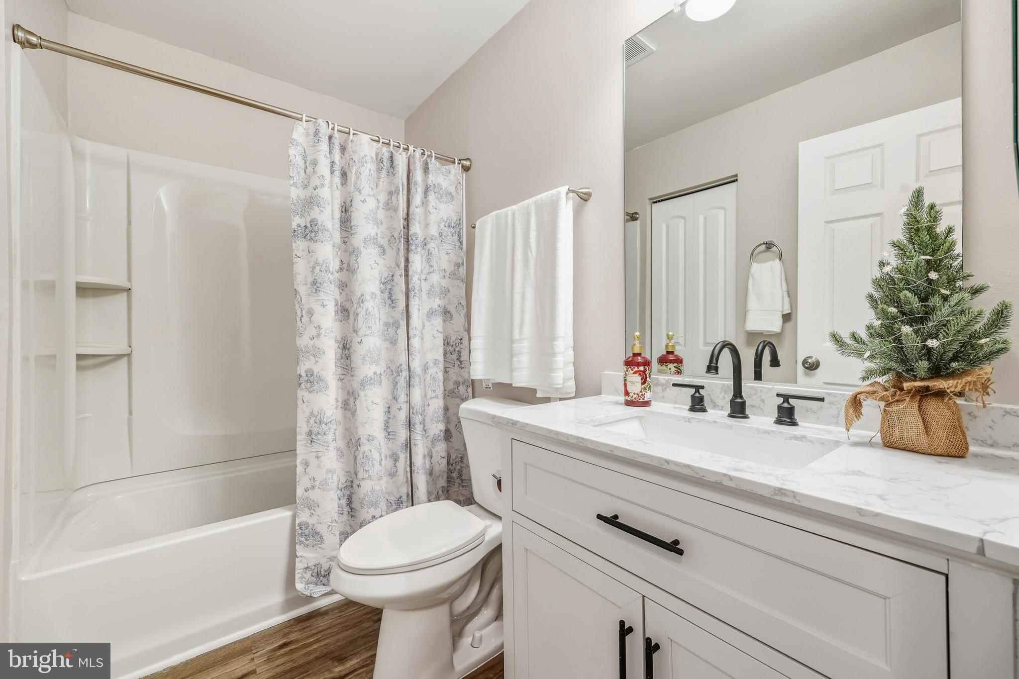 207 Spotswood Road Locust Grove, VA 22508 - Photo 26 of 58 a bathroom with a sink toilet and shower