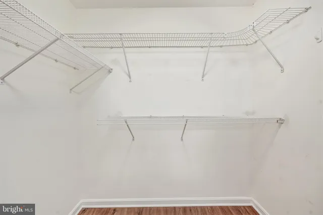 a view of a room with racks on the wall