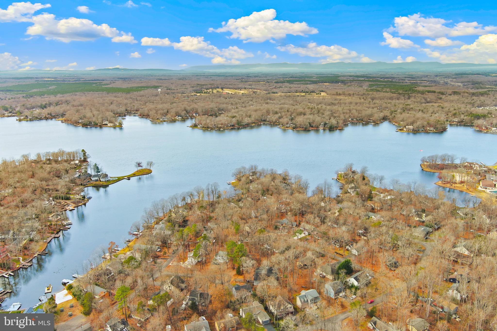 207 Spotswood Road Locust Grove, VA 22508 - Photo 40 of 58 a view of a lake and beach