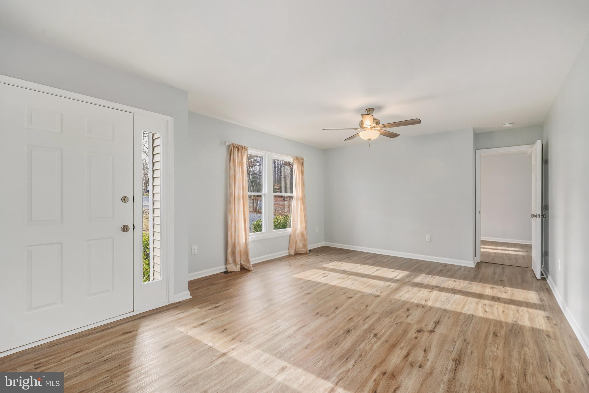 207 Spotswood Road Locust Grove, VA 22508 - Photo 5 of 58 a view of a livingroom with wooden floor