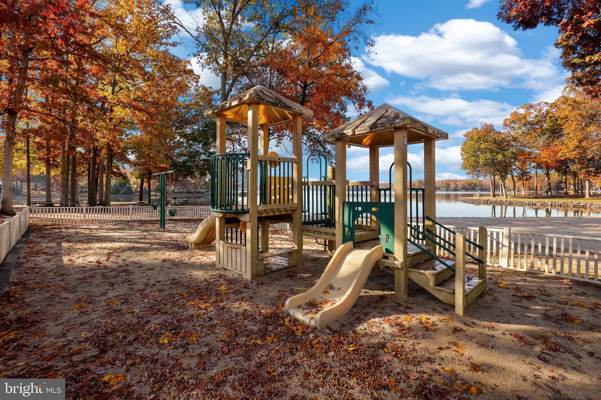 207 Spotswood Road Locust Grove, VA 22508 - Photo 51 of 58 a view of a park with swings and slides