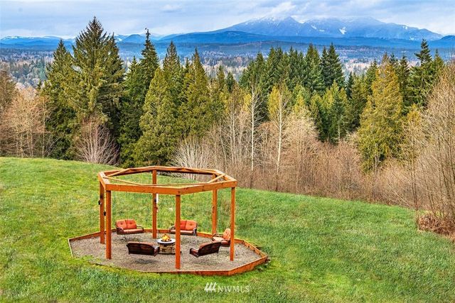 a view of a deck with chair and table