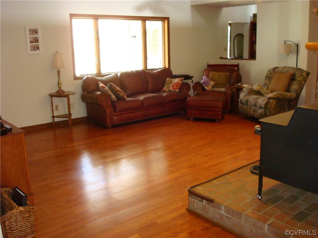 12803 Spring Run Road Chesterfield, VA 23832 - Photo 12 of 40 a living room with furniture and a window