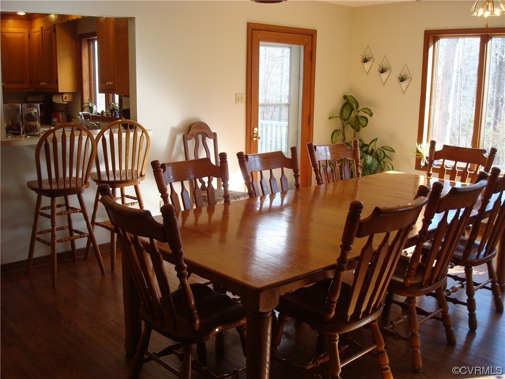 12803 Spring Run Road Chesterfield, VA 23832 - Photo 14 of 40 a view of a dining room with furniture and wooden floor