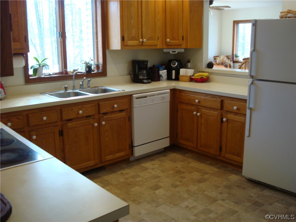 12803 Spring Run Road Chesterfield, VA 23832 - Photo 17 of 40 a kitchen with a sink cabinets and window