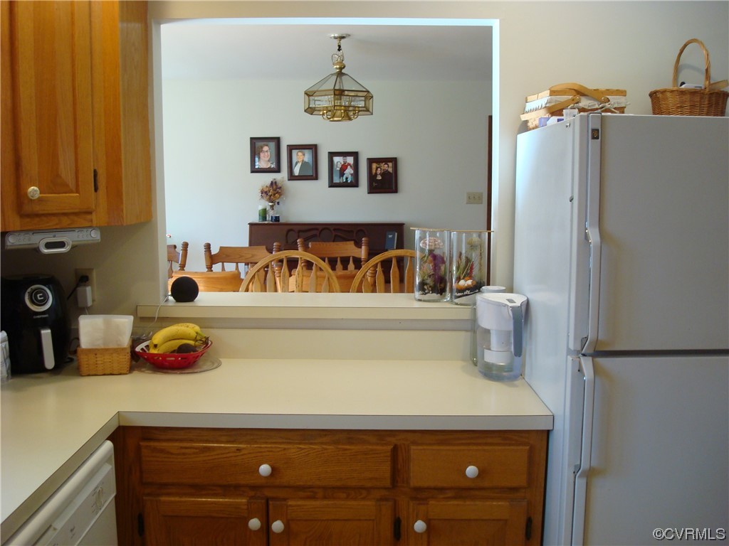 12803 Spring Run Road Chesterfield, VA 23832 - Photo 18 of 40 a kitchen with a refrigerator and a sink
