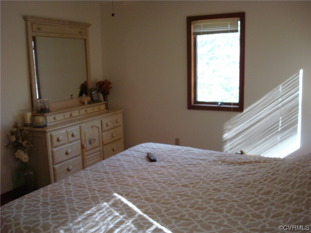 12803 Spring Run Road Chesterfield, VA 23832 - Photo 23 of 40 a bedroom with a bed and a window