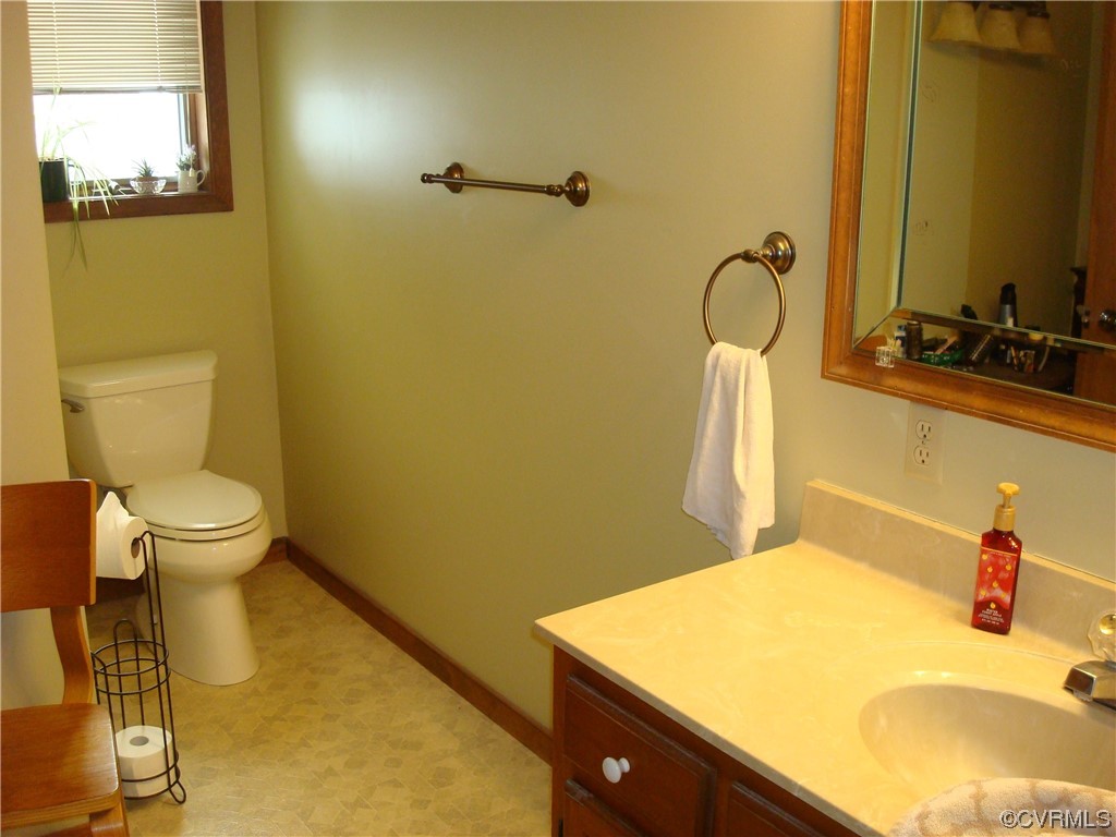 12803 Spring Run Road Chesterfield, VA 23832 - Photo 26 of 40 a bathroom with a sink and a toilet