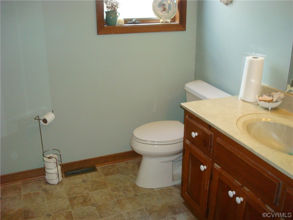 12803 Spring Run Road Chesterfield, VA 23832 - Photo 30 of 40 a bathroom with a sink and a toilet