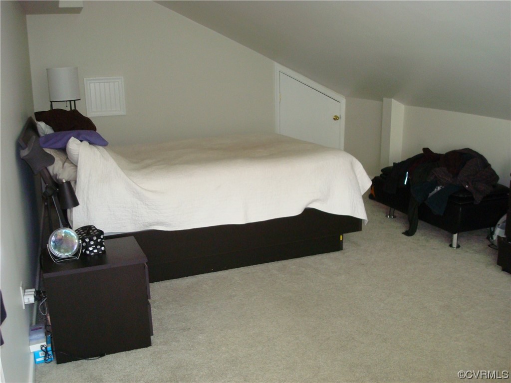 12803 Spring Run Road Chesterfield, VA 23832 - Photo 37 of 40 a bedroom with a bed and a lamp