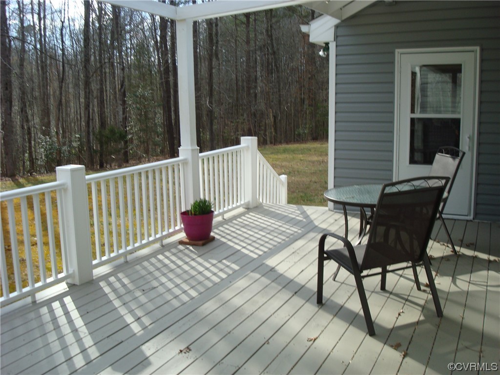 12803 Spring Run Road Chesterfield, VA 23832 - Photo 5 of 40 a view of a chairs on wooden deck