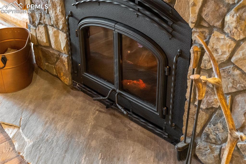 626 Stacker Drive Hartsel, CO 80449 - Photo 32 of 50 a living room with a couch and a stove