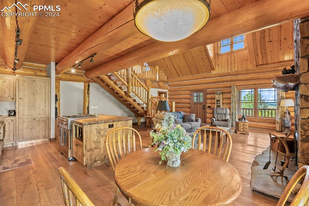 626 Stacker Drive Hartsel, CO 80449 - Photo 34 of 50 a view of a dining room with furniture and wooden floor
