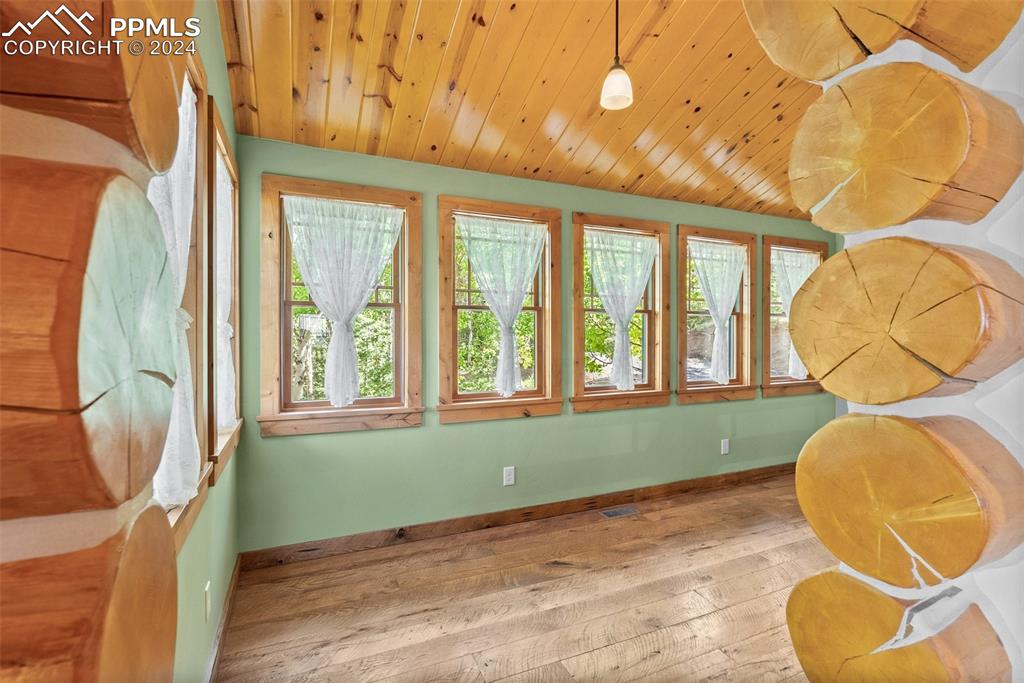 626 Stacker Drive Hartsel, CO 80449 - Photo 43 of 50 a view of a room with wooden floor and windows