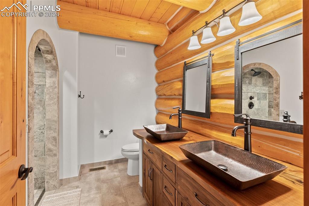 626 Stacker Drive Hartsel, CO 80449 - Photo 46 of 50 a bathroom with a sink and a mirror