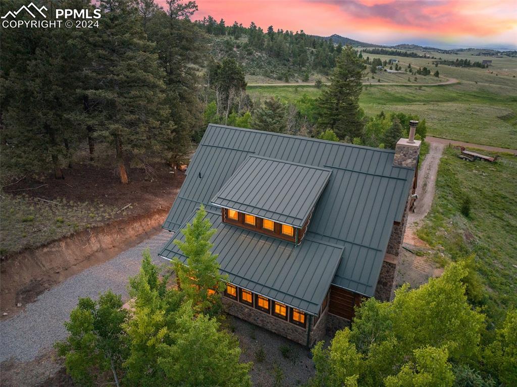 626 Stacker Drive Hartsel, CO 80449 - Photo 6 of 50 a view of a roof deck with two chairs and a table