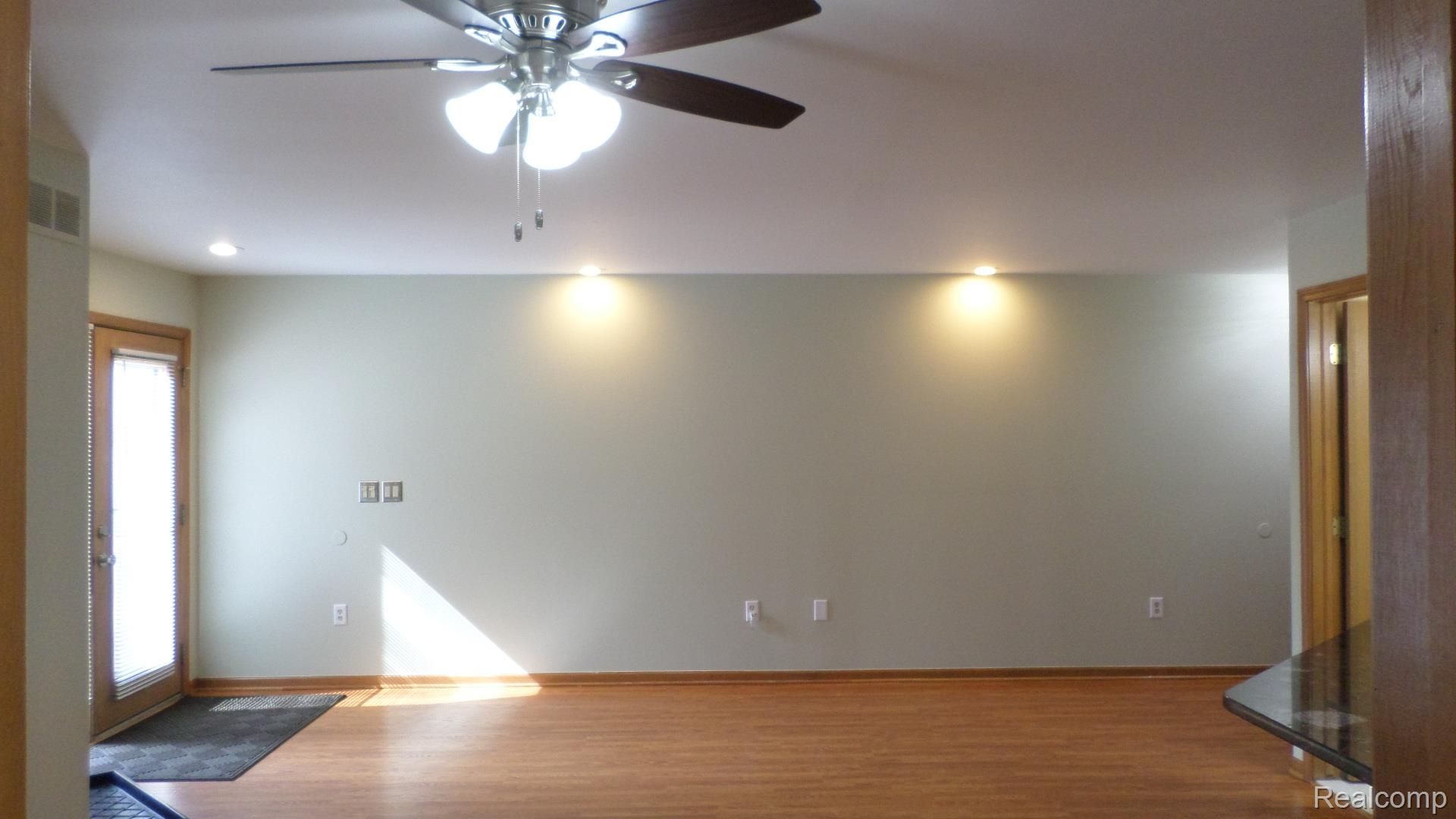 33831 Hooker Road, Unit 6 New Baltimore, MI 48047 - Photo 18 of 34 Spare room with recessed lighting, ceiling fan, and wood finished floors
