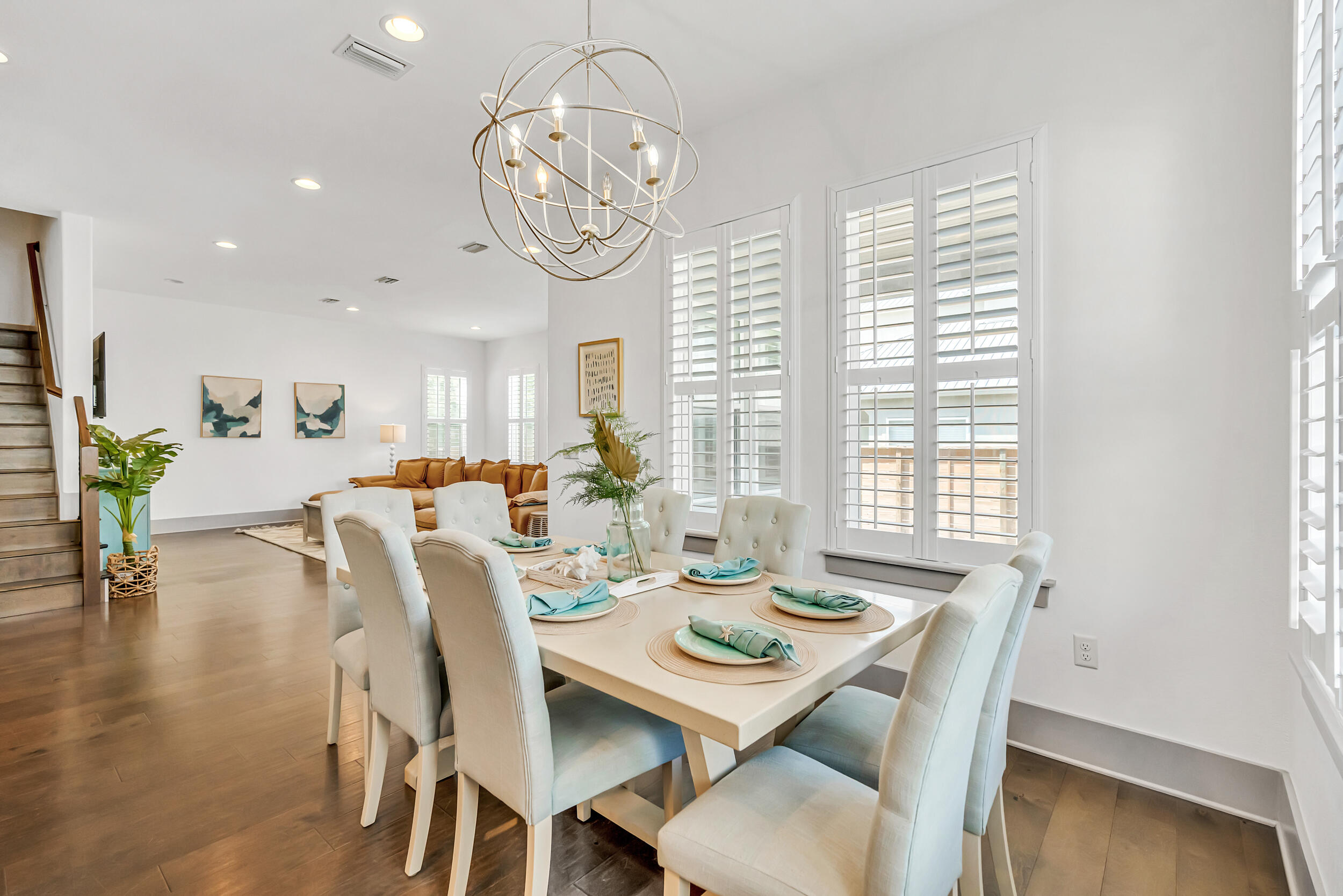 70 Ruth Street Miramar Beach, FL 32550 - Photo 14 of 50 a view of a dining room with furniture window and wooden floor