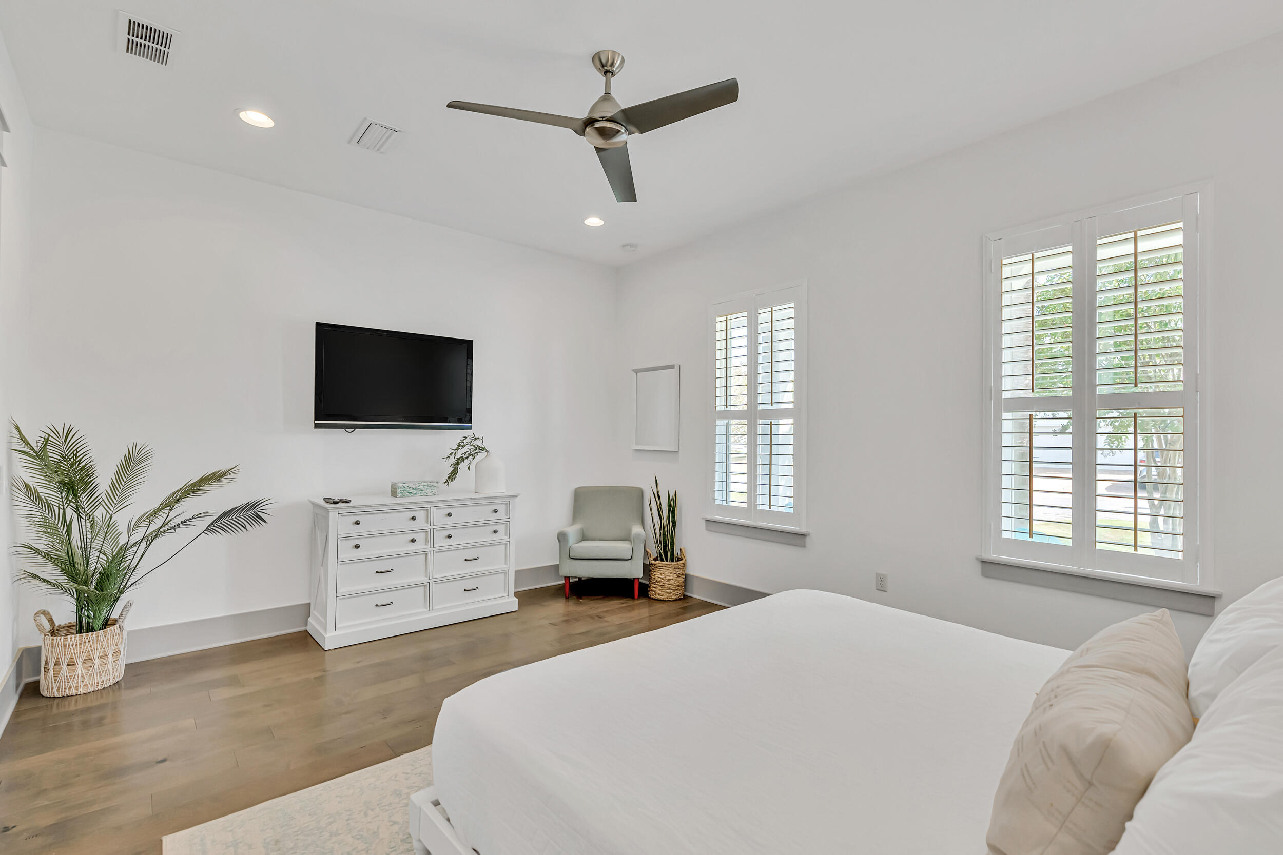 70 Ruth Street Miramar Beach, FL 32550 - Photo 21 of 50 a bedroom with a bed a window and a flat screen television