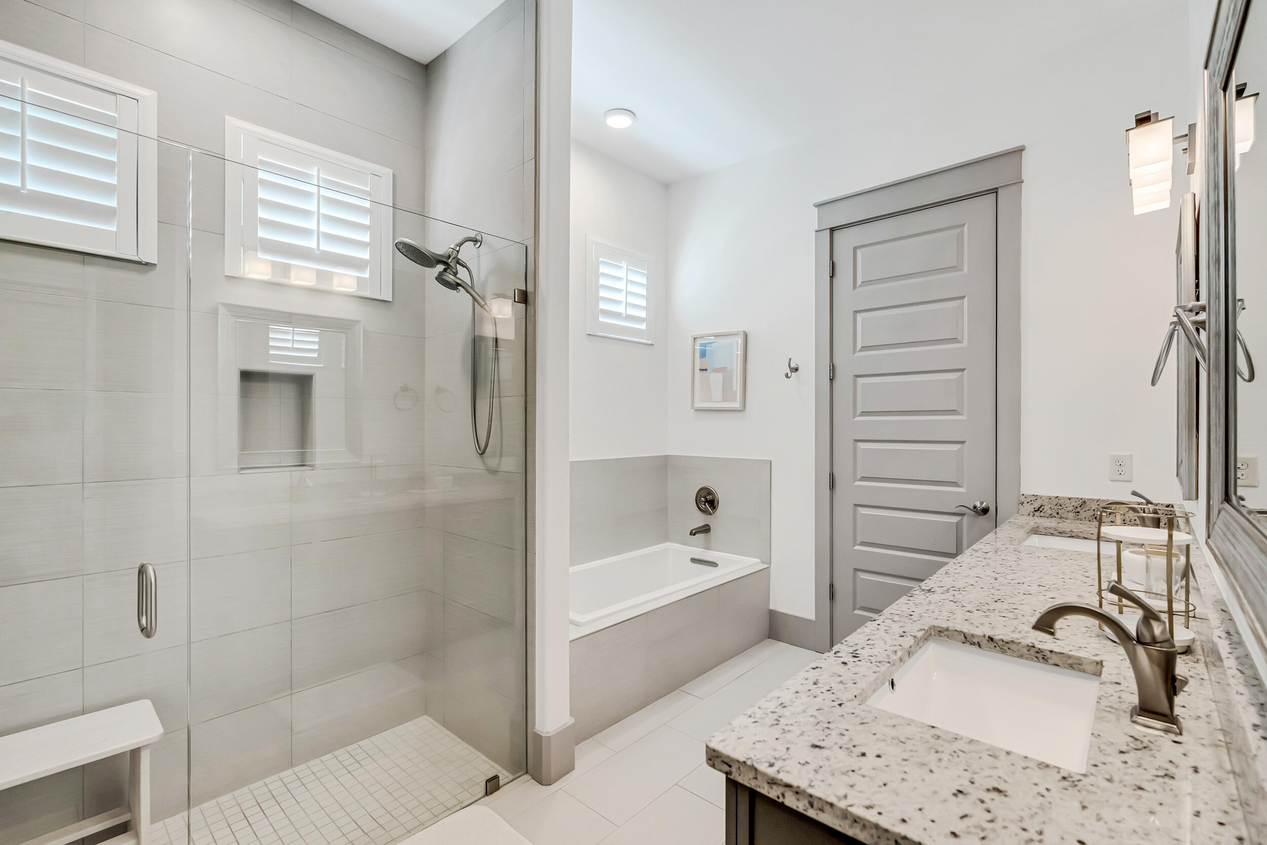 70 Ruth Street Miramar Beach, FL 32550 - Photo 22 of 50 a bathroom with a tub sink and mirror