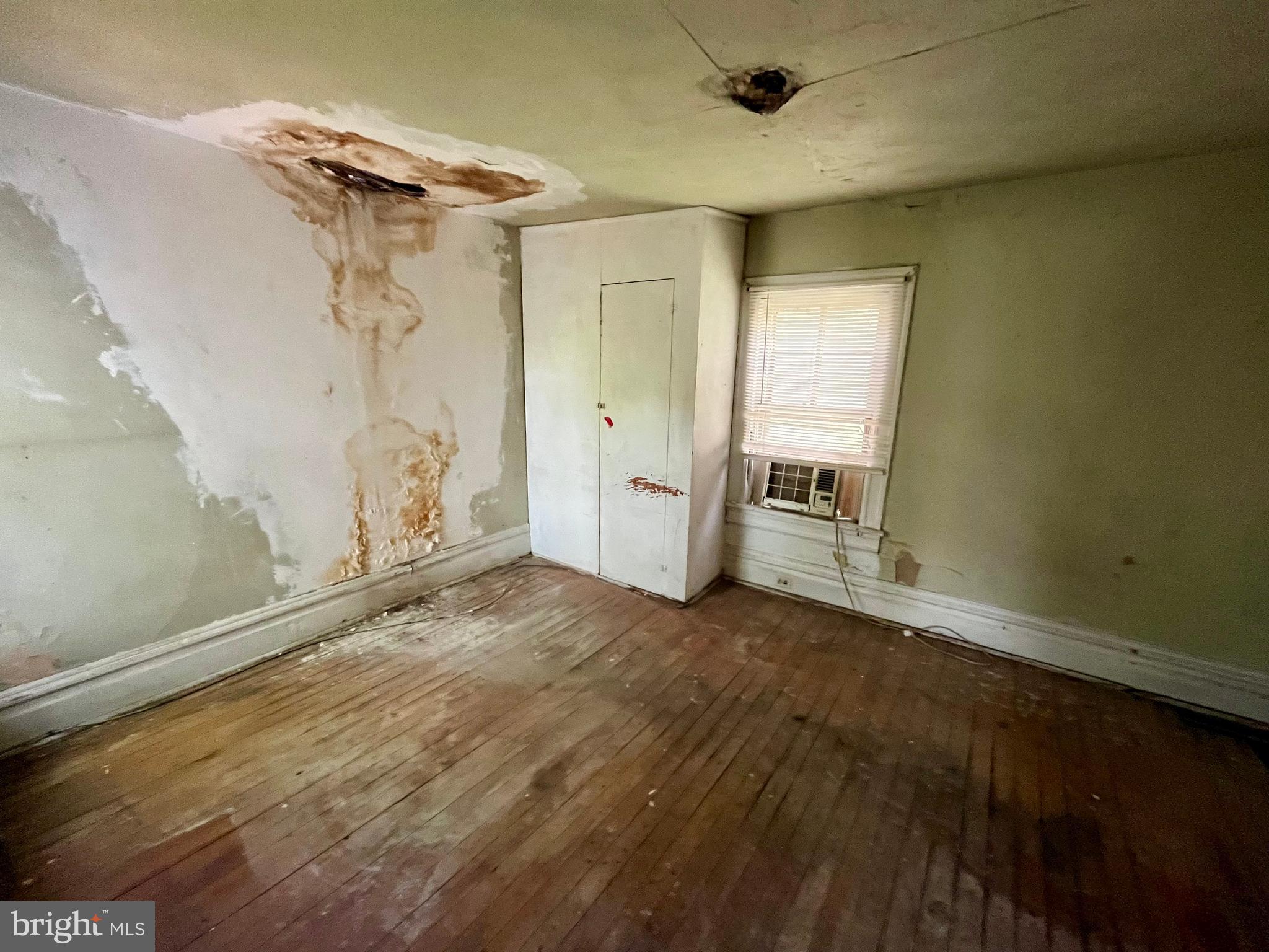 407 Carruthers Street Lexington, VA 24450 - Photo 15 of 29 a view of empty room with wooden floor and fan
