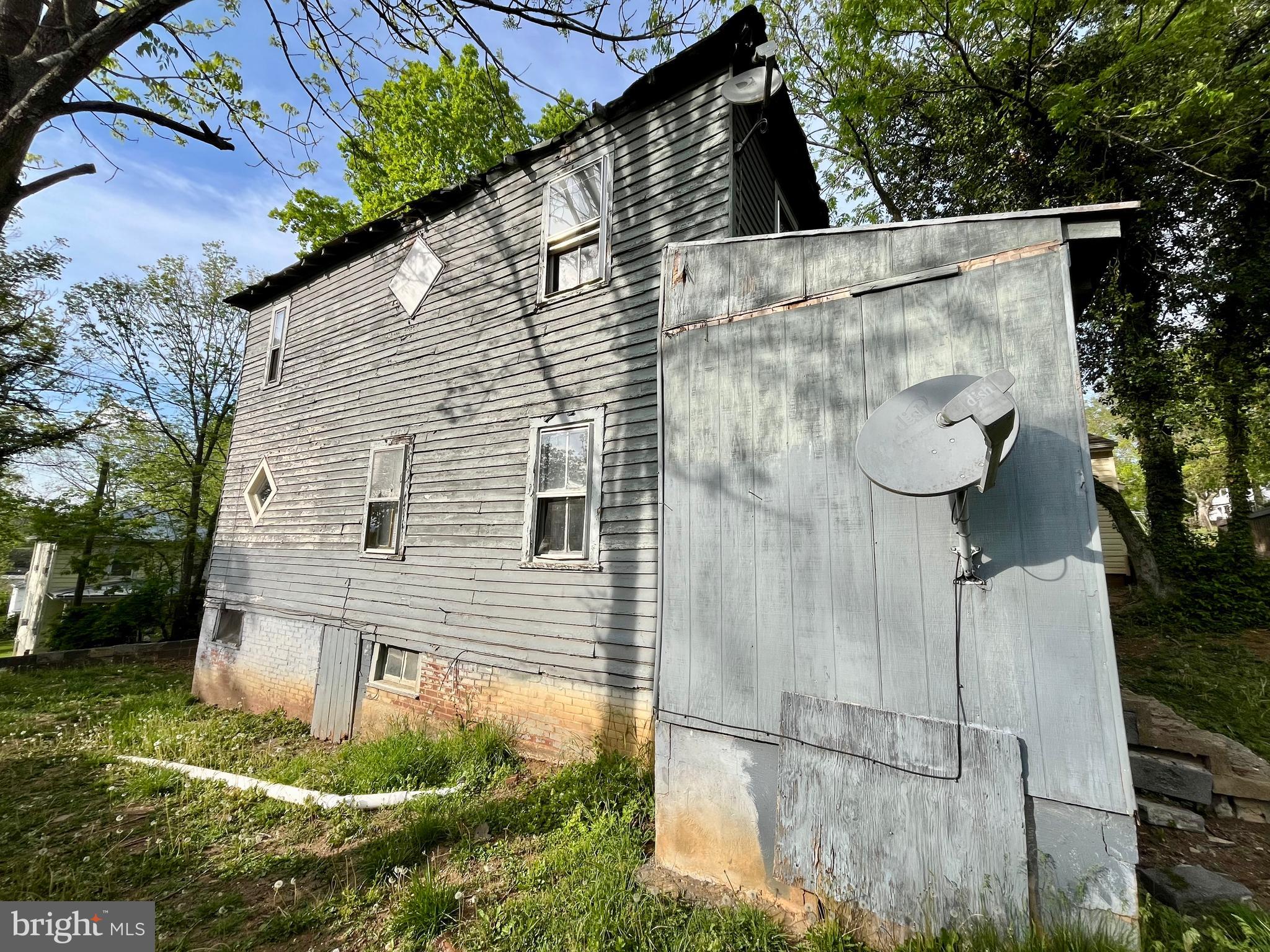 407 Carruthers Street Lexington, VA 24450 - Photo 23 of 29 a view of a house with a yard