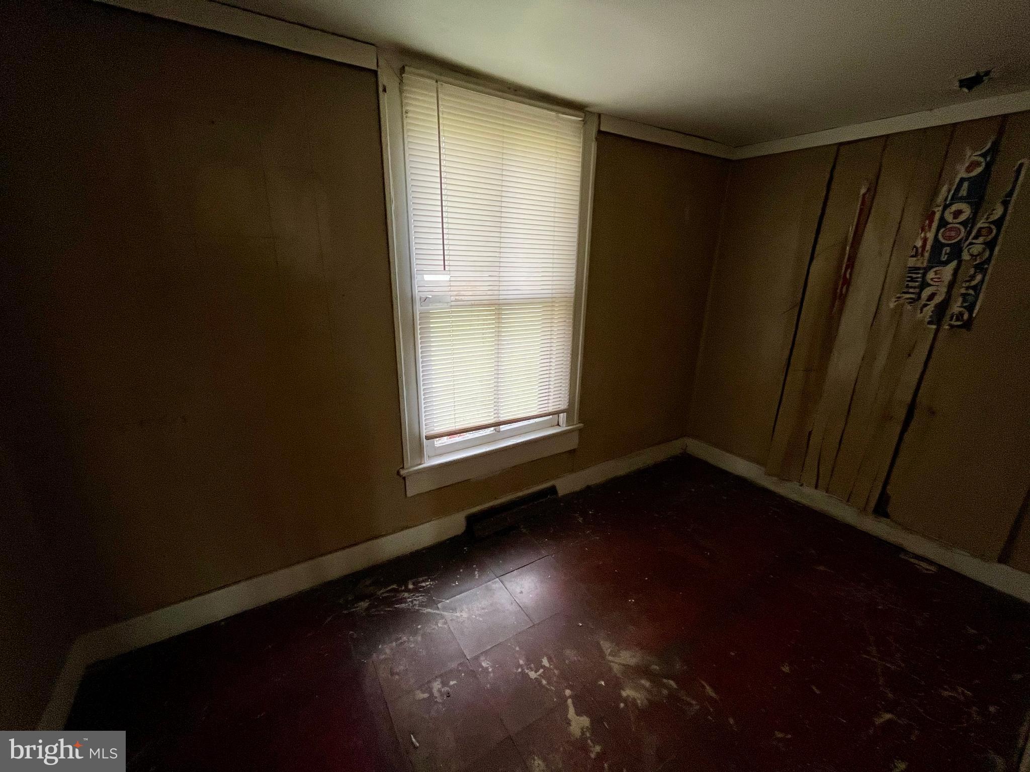407 Carruthers Street Lexington, VA 24450 - Photo 8 of 29 a view of room with hardwood floor and window